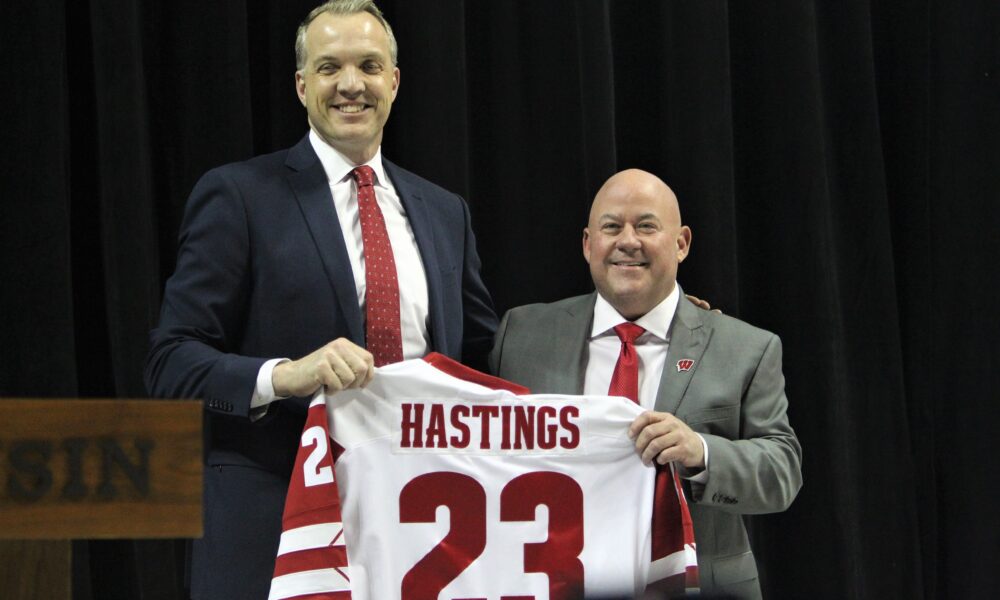 Wisconsin Badgers hockey head coach Mike Hastings being introduced by Athletic Director Chris McIntosh