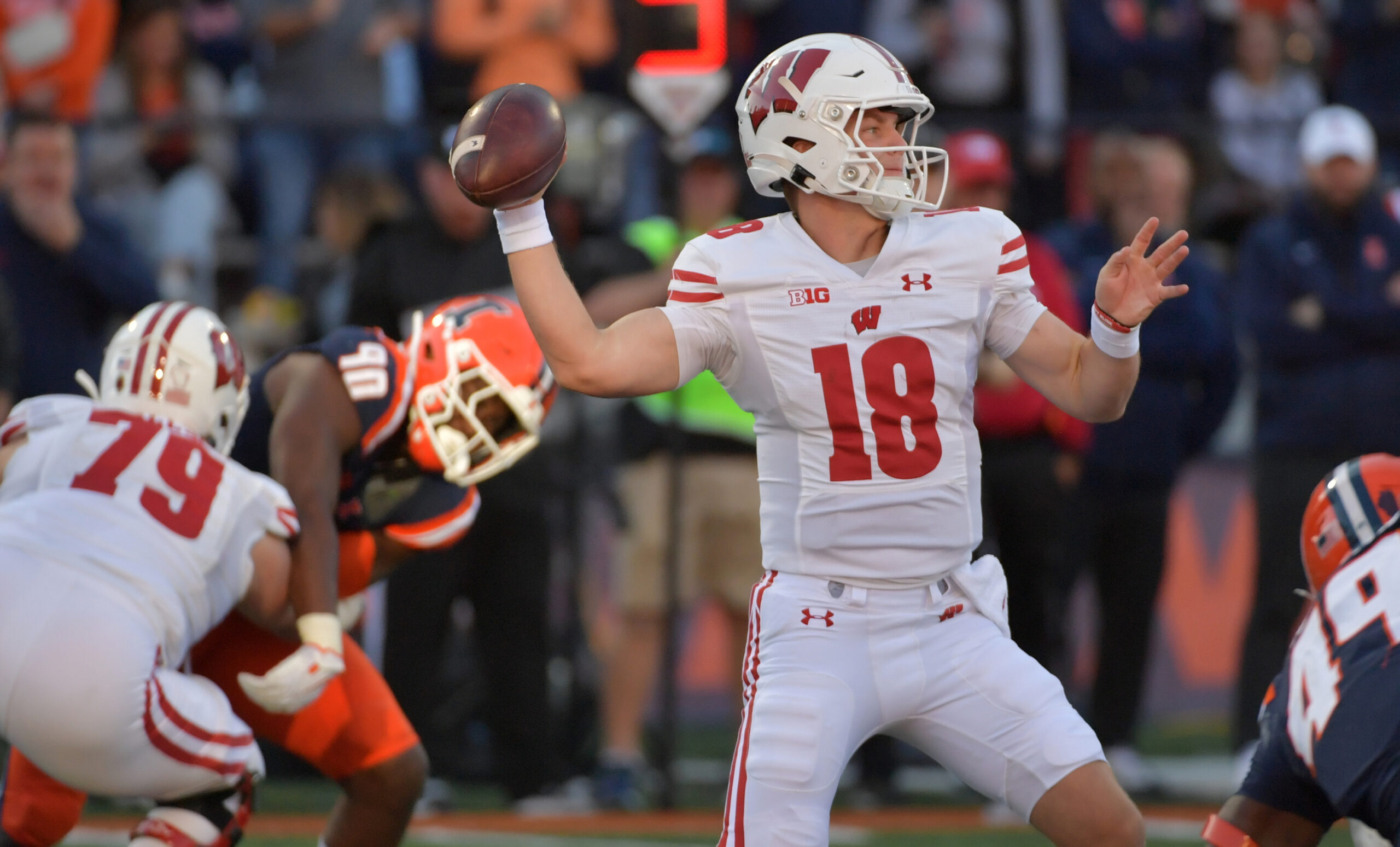 Wisconsin football quarterback Braedyn Locke leads the Badgers to a win over Illinois