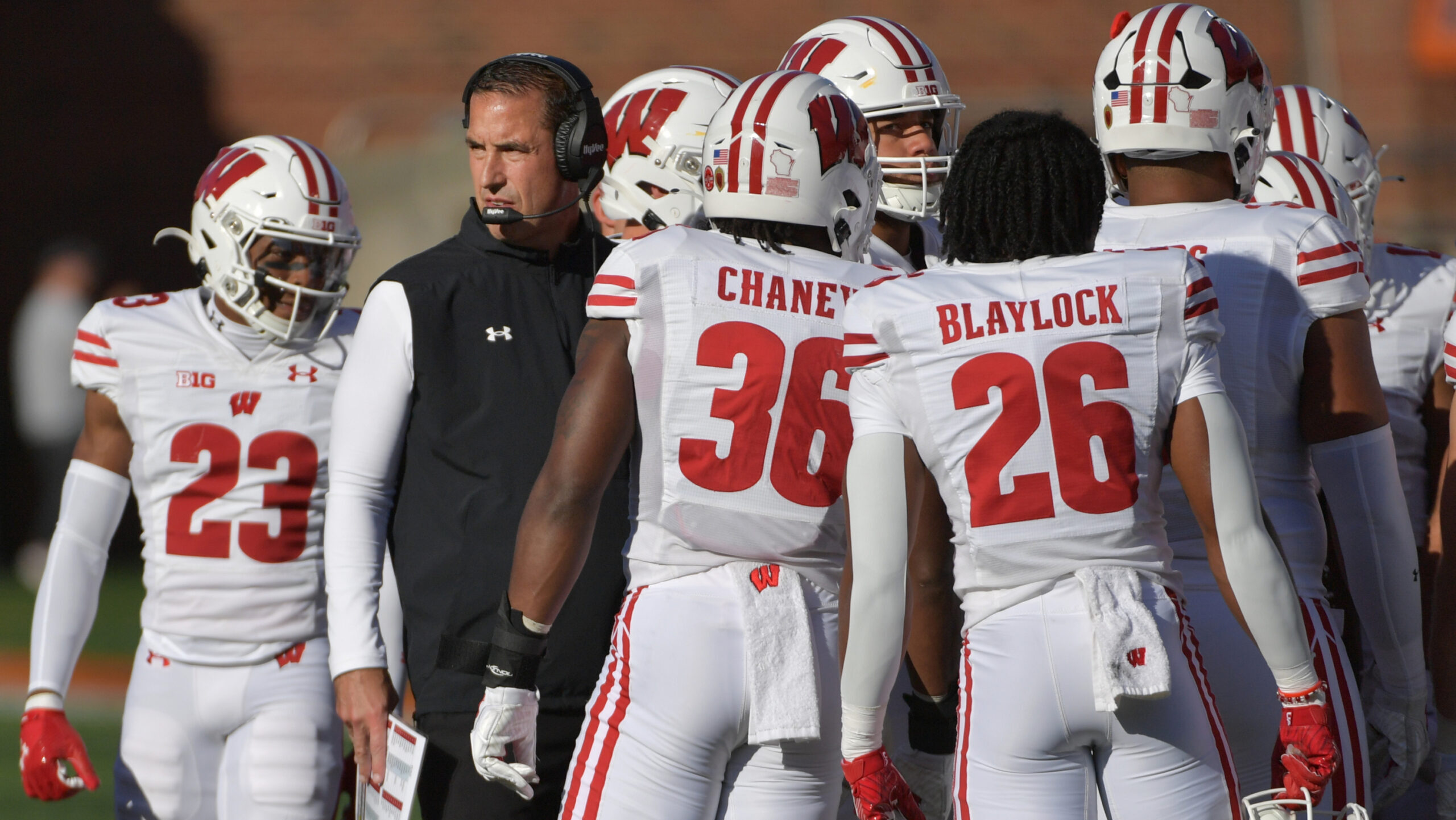 Wisconsin Badgers football head coach Luke Fickell talks to his players on the sideline