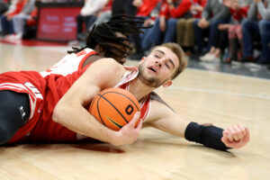 Wisconsin basketball forward Tyler Wahl fights for every loose ball