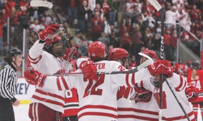 Wisconsin women's hockey players celebrate a goal in a victory to clinch a spot in the NCAA Tournament Frozen Four